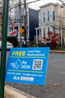 Washington, DC, A sign in the Anacostia neighborhood promises the replacement of all lead service