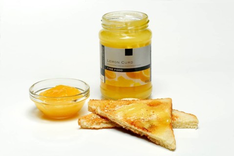 Lemon cream, in glass bowl, on toast, jam, lemon spread