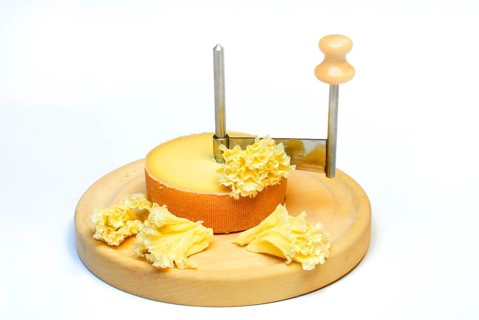 Cheese 'Tete de Moine' with rotating knife Girolle, cheese rosettes, monk's head
