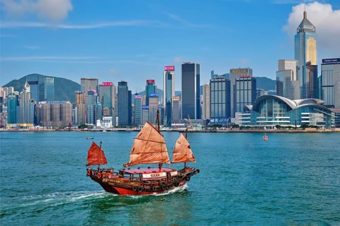 HONG KONG, CHINA, MAY 1, 2018: Hong Kong skyline cityscape downtown skyscrapers over Victoria