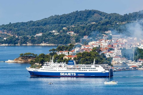 Seajets ferry and boats in the sea off the Mediterranean island of Skiathos, Greece, Europe