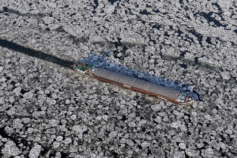 Aerial view of a barge during ice conditions on the Elbe, transport, traffic, weather, climate,