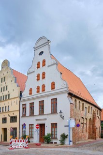 Crooked Baroque gabled house and former warehouse, heritage-protected corner building Am Poeler Tor