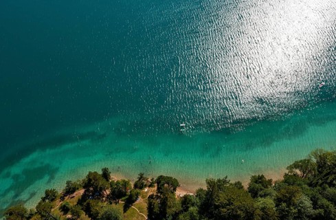 Drone shot, from above, bathing beach with boats at Fuschlsee, Fuschl am See, Salzkammergut, Land