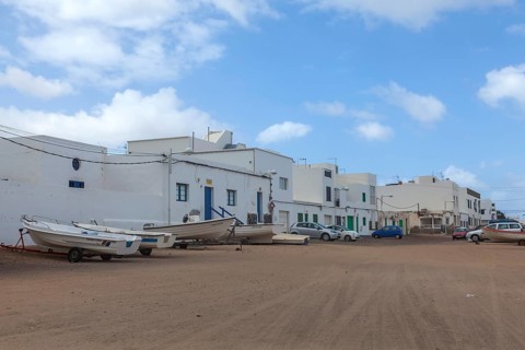 Village street in Caleta de Famara, municipality of Teguise, Lanzarote, Canary Island, Canary