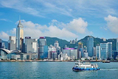 Hong Kong, China, May 1, 2018: Hong Kong skyline cityscape downtown skyscrapers over Victoria