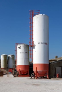 Storage tanks at Mi Swaco Minerals division, a Schlumberger company, Great Yarmouth, Norfolk,
