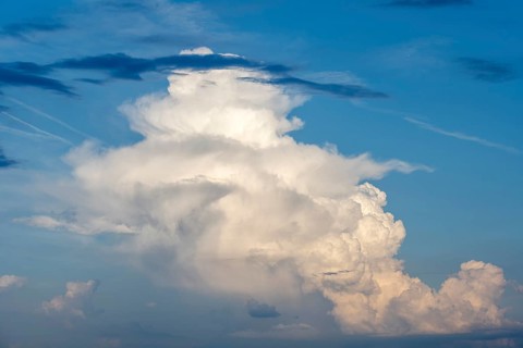 Cumulonimbus, thundercloud against blue sky, Germany, Europe