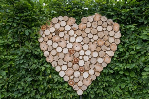 Heart made of small wooden discs, Münsterland, North Rhine-Westphalia, Germany, Europe