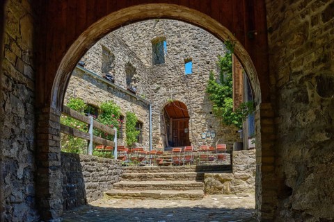 View through the castle gate into the castle courtyard, medieval castle ruins Sulzberg in Allgäu