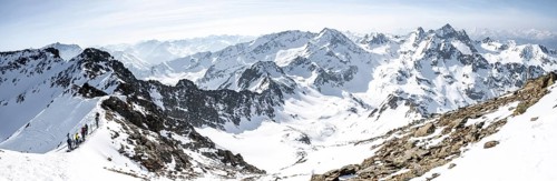 Ski tourers at the ski depot, view of snow-covered mountain panorama, view from Sulzkogel, behind