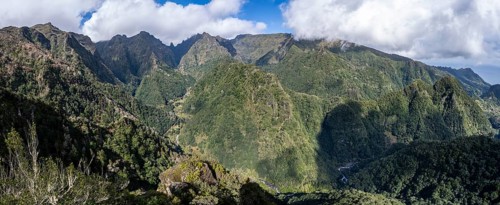 Densely overgrown steep mountains, green mountain landscape, view from the Miradouro dos Balcões,