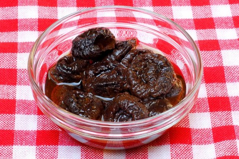 Plums, dried, soaked in water, prune