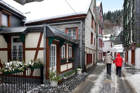 Tourists in the historic centre of Monschau an der Rur, Eifel, North Rhine-Westphalia, Germany,