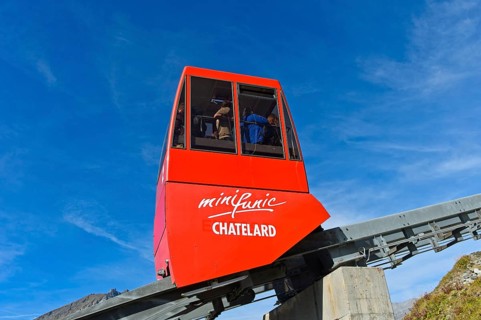 Red carriage of the funicular Minifunic at Châtelard amusement park, Parc d'Attractions du