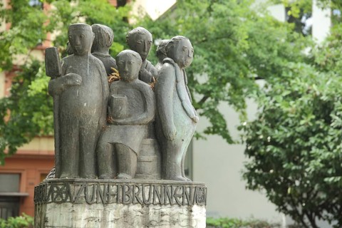 Guild fountain with modern figures at Affentorplatz, fountain, sculpture, Old Sachsenhausen,