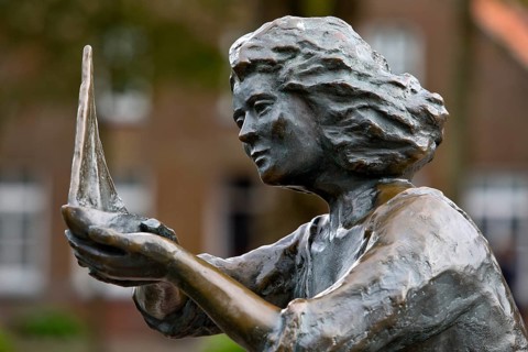 Sculpture Caroline cradles a ship in safety, artist Peters u. Petersen, Carolinensiel, East Frisia,