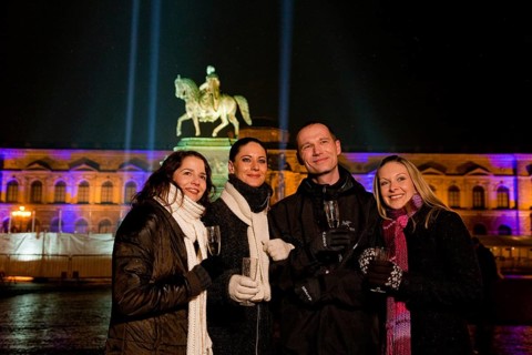 Young people celebrate New Year's Eve on the theatre square in Dresden