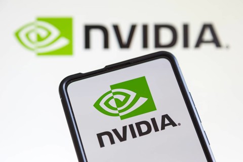 Nvidia logo of the developer of graphics processors on a mobile phone and computer screen