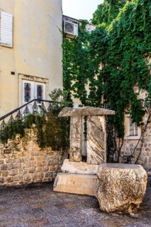 Poets' Square with stone Pi monument, Budva Old Town, Montenegro, Budva, Montenegro, Europe