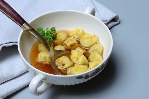 Cappelletti, pasta with broth in shell, pasta