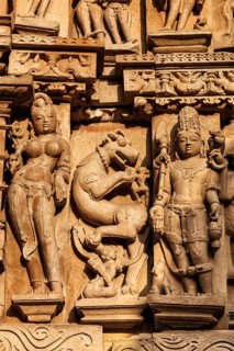 Stone carving bas relief sculptures on Vaman Temple, Khajuraho, Madhya Pradesh, India, Asia