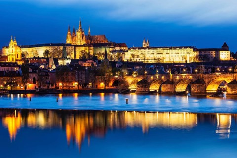 View of Charles Bridge (Karluv most) and Prague Castle in twilight. Prague, Czech Republic, Europe
