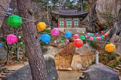 SEORAKSAN, SOUTH KOREA, APRIL 14, 2017: Kyejoam Seokgul Hermitage shrine and Ulsanbawi rock in