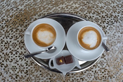 Two cappuccinos on a bistro table, Bavaria, Germany, Europe