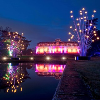 Illuminated Benrath Palace in the evening with the mirror pond at Christmas Wunderwelt, Düsseldorf,