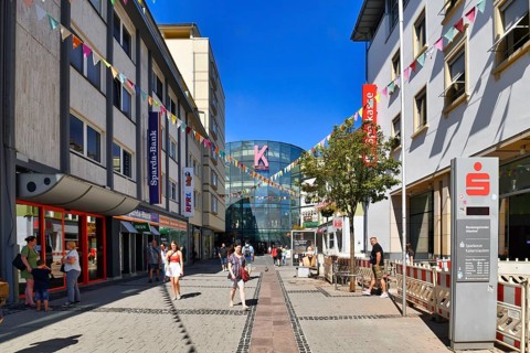 Kaiserslautern, Germany, August 2022: Shopping street called 'Fackelstrasse' with people and