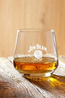 March 28, 2019, Minsk, Belarus, sniffer glass with kentucky straight bourbon whiskey on wooden