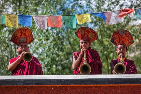 HUNDER, INDIA, SEPTEMBER 6, 2011: Tibetan Buddhist monks playing traditional musical instruments.