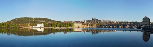 Panorama view of Charles bridge over Vltava river and Gradchany (Prague Castle) and St. Vitus