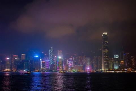 HONG KONG, CHINA, APRIL 28, 2018: Hong Kong skyline cityscape downtown skyscrapers over Victoria