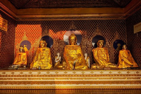 Buddha statues in Burma famous sacred place and tourist attraction landmark, Shwedagon Paya pagoda.