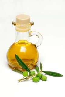 Bottle with olive oil, olive branch, olives, olive oil