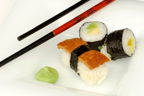 Sushi on tray with chopsticks, wasabi paste, Japanese food, chopsticks, chopsticks