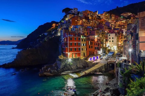 Fishing village of Riomaggiore, blue hour, Cinque Terre, province of La Spezia, Liguria, Italy,