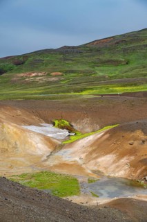 Volcanic landscape with colourful hills, Krafla geothermal area, Northern Iceland, Iceland, Europe