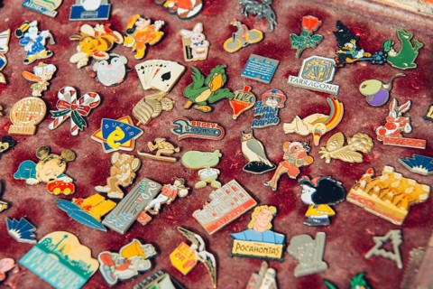 Antique badges, pins at flea market