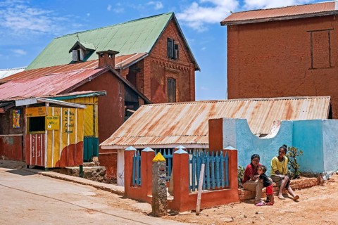 Malagasy girls with child in street in the village Ambohimanga Rova near Antananarivo, Analamanga