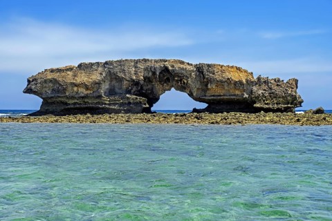 Natural rock arch in the Mozambique Channel in front of the fishing village Andavadoaka near
