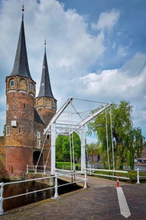 Oostport (Eastern Gate) of Delft illuminated at night. Delft, Netherlands
