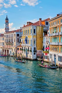 VENICE, ITALY, JUNE 27, 2018: Grand Canal with boats and gondolas on sunset, Venice, Italy, Europe
