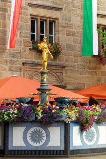 Margrave George Fountain, polygonal iron basin, gilded knight figure stands on richly decorated