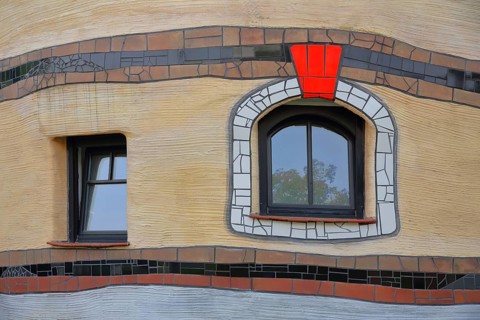 Detail with two windows of the Hundertwasserhaus Waldspirale, red, frame, Darmstadt, Bergstrasse,