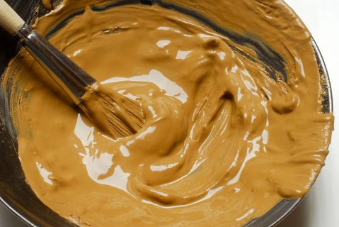 Red clay mixed with water, clay, healing clay, mix, stir