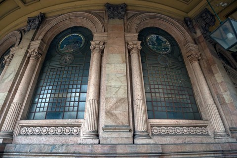 Window of the Palazzo della Borsa, built between 1907 and 1912, in Piazza de Ferrari, Genoa, Italy,