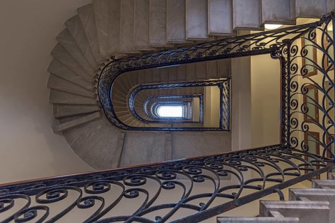 Staircase around 1900 with a wrought-iron banister, in a residential building, Genoa, Italy, Europe
